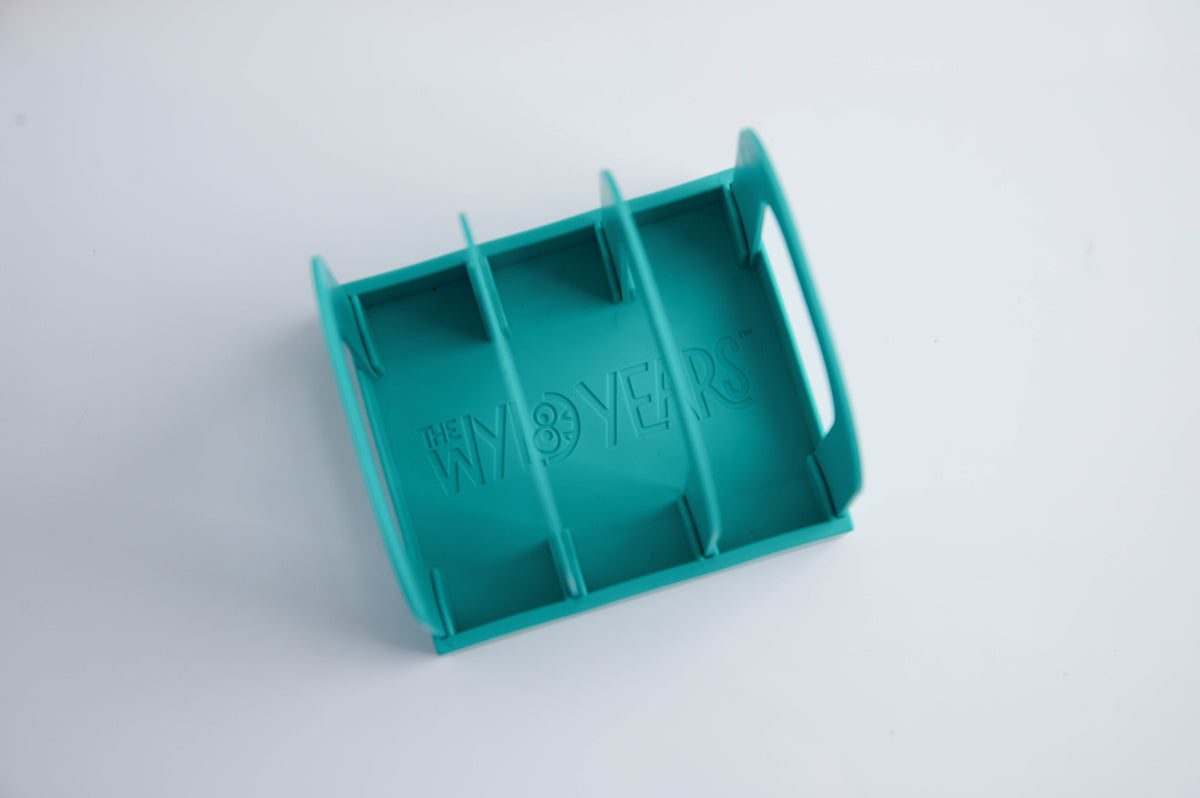 Overhead view of an empty Mylk Mate showing its three bag slots